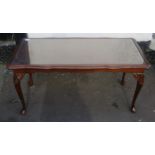 20th century Mahogany glass topped coffee table. App. 46cm H x 97.5cm W x 48.5cm D