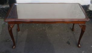 20th century Mahogany glass topped coffee table. App. 46cm H x 97.5cm W x 48.5cm D