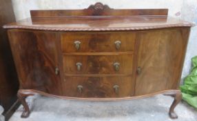 Early 20th century serpentine fronted mahogany sideboard, on ball and claw supports. App. 108cm H