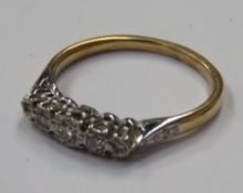 Unhallmarked Victorian Gold and Platinum set dress ring, with five small diamonds