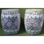 Two similar Oriental handpainted and piercework decorated ceramic barrel form window seats.