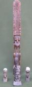 Heavily carved tribal treen figure, busts, plus soapstone carvings