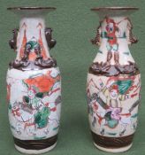Pair of crackle glazed ceramic vases decorated with oriental battle scenes. App. 20cm High