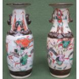 Pair of crackle glazed ceramic vases decorated with oriental battle scenes. App. 20cm High