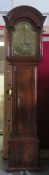 18th/19th century Oak and Mahogany cased longcase clock, with brass dial by Warburton. Approx. 223cm