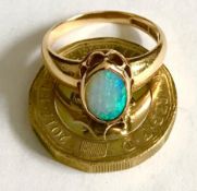 18ct GOLD DRESS RING SET WITH CABOCHON OVAL OPAL STONE, GROSS WEIGHT APPROXIMATELY 4.8g
