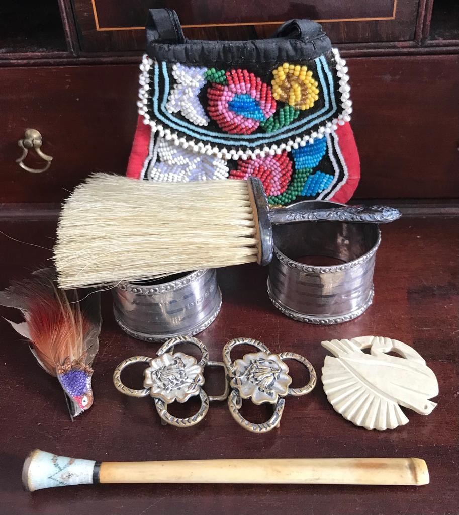 BEADWORK PURSE, TWO SILVER NAPKIN RINGS, BRUSH, BUCKLE, TWO BIRD BROOCHES AND CIGARETTE HOLDER