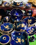 FINE JLMENAUGRAF VON HENNEBERG PORZELLAN- PORCELAIN COBALT BLUE AND RAISED GILDING DINNER SERVICE OF