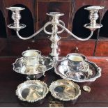 SEVEN PIECES OF SILVER PLATED WARE COMPRISING CANDELABRUM, TWO MINIATURE URNS, TWO MEDIUM BOWLS