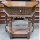 Early 20th century linen fold fronted oak hall table. Approximately. 72.5cm H x 76cm W x 39.5cm D