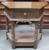 Early 20th century linen fold fronted oak hall table. Approximately. 72.5cm H x 76cm W x 39.5cm D