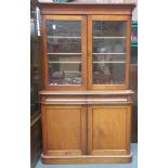 Victorian mahogany two door glazed bookcase, fitted with two drawers and cupboard doors below.