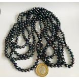 ROPE OF CULTURED DARK MULTI-COLOURED PEARLS, APPROXIMATELY 252cm LONG