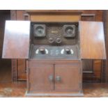 Early 20th century inlaid mahogany cased British Broadcasting Coil two valve receiver, by British