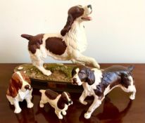 TWO ROYAL DOULTON SPANIELS AND TWO BESWICK SPANIELS