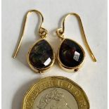 A PAIR OF GILT METAL PASTE EARRINGS