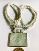 JADE RECTANGULAR PENDANT UPON JADE AND BAROQUE PEARL NECKLACE, APPROXIMATELY 40cm LONG