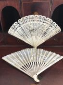 FINELY WORKED BONE FAN, ALSO PAPER FAN WITH SILVERED DECORATION