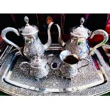 GOOD QUALITY INDIAN SILVER COLOURED METAL UNHALLMARKED TEA SET COMPRISING OF TRAY, TEAPOT, JUG,