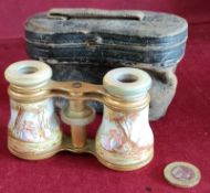 PAIR OF LATE 19th CENTURY GILT METAL AND MOTHER OF PEARL OPERA GLASSES WITH ENAMELLED DECORATION