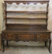 19th century oak Welsh style kitchen dresser with plate rack, on cabriole supports. Approx. 200cms H