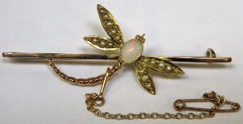 9ct Gold bar brooch with mounted Dragonfly, decorated with Opal and Pearl type stones