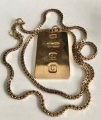 9ct GOLD INGOT PENDANT TOGETHER WITH A GOLD COLOURED BOX CHAIN, GROSS WEIGHT APPROXIMATELY 47.2g AND