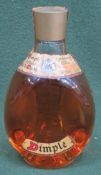 Unopened vintage small bottle of Dimple whisky. Approx. 17.5cm H