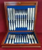 CASED SET OF TWENTY-FOUR SILVER PLATED FISH KNIVES AND FORKS WITH MOTHER OF PEARL HANDLES