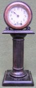 Small vintage Ebonised Column form clock. Approx. 21.5cm H x 18cm W