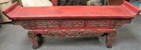 LATE 19TH/EARLY 20TH CENTURY ORIENTAL RED LACQUERED CARVED ALTAR TABLE. APPROX. 44CM H X 122.5CM W X