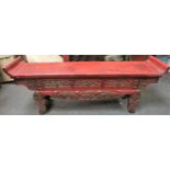 LATE 19TH/EARLY 20TH CENTURY ORIENTAL RED LACQUERED CARVED ALTAR TABLE. APPROX. 44CM H X 122.5CM W X