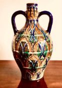 BIRKENHEAD DELLA ROBBIA POTTERY TWO HANDLED AMPHORA FORM VASE, HP INCISED TO BASE