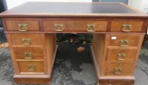 Early 20th century oak pedestal writing desk, with leather interior. Approx. 74cms H x 122cms W x