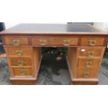 Early 20th century oak pedestal writing desk, with leather interior. Approx. 74cms H x 122cms W x