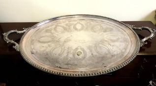 LARGE OVAL SILVER PLATED TRAY WITH FERN ENGRAVED DECORATION AND BEADED BORDER, APPROXIMATELY 61 x