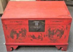 LATE 19TH/EARLY 20TH CENTURY ORIENTAL RED LACQUERED TRUNK ON STAND, WITH FIGURE FORM DECORATION TO