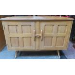 Ercol mid 20th century oak two door sideboard. Approx. 83cm H x 123cm W 49cm D