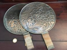 PAIR OF CHINESE POLISHED BRONZE HAND MIRRORS, DIAMETER APPROXIMATELY 23cm. NOTE- REVERSE LATER HOOKS