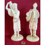 PAIR OF ROYAL WORCESTER BLUSH IVORY HANDPAINTED AND GILDED FIGURES DEPICTING WATER CARRIERS, BOTH