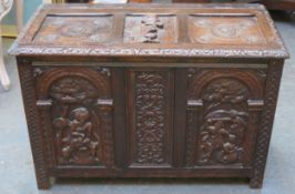 late 9th century/early 20th heavily carved panelled oak blanket chest 60cm H x 90cm W x 42.5cm D