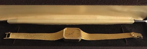 GOLD COLOURED OMEGA WATCH AND STRAP, PURCHASED ABROAD, BIDDER TO TEST FOR GOLD, GROSS WEIGHT