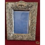 HALLMARKED SILVER RELIEF DECORATED PHOTO FRAME, BIRMINGHAM ASSAY DATED 1901, APPROXIMATELY 24 x 18.