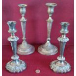 TWO PAIRS OF SILVER PLATED FILLED CANDLESTICKS, LARGEST PAIR APPROXIMATELY 28cm HIGH