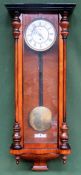 Late 19th/Early 20th century walnut cased Vienna wall clock with circular enamelled dial. Approx.