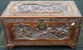 Heavily carved Oriental camphor chest. Approx. 52cm H x 105cm W x 47cm D