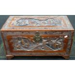 Heavily carved Oriental camphor chest. Approx. 52cm H x 105cm W x 47cm D