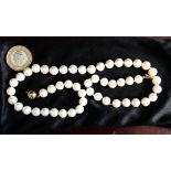 SINGLE STRAND OF GOOD CULTURED PEARLS, FIFTY-ONE PEARLS, APPROXIMATELY 17.5 inches LONG, 18ct CLIP