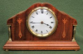 Early 20th century Mahogany inlaid small French mantle clock, with brass column form decoration.