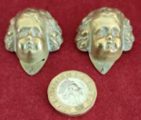 PAIR OF BRASS CHERUB HEAD FORM DRESS CLIPS, KELM LTD, LONDON, APPROXIMATELY 4 x 3cm